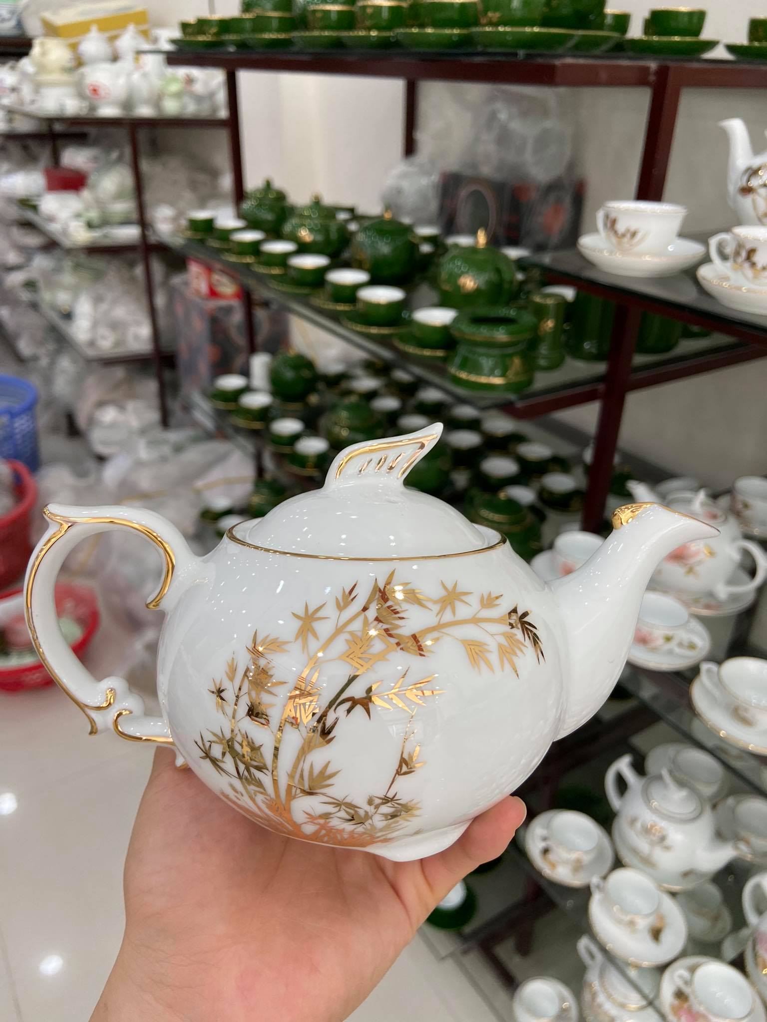 Bộ trà ba chân Công tre vàng kim