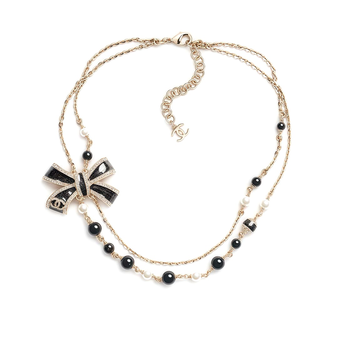 DÂY CHUYỀN CHANEL 25B NƠ VÀNG ĐEN ORNAMENT