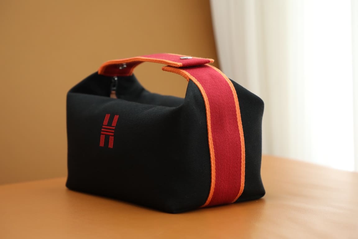 TÚI HERMES TROUSSE DE TOILETTE BRIDE A BRAC PM H MÀU ĐỎ