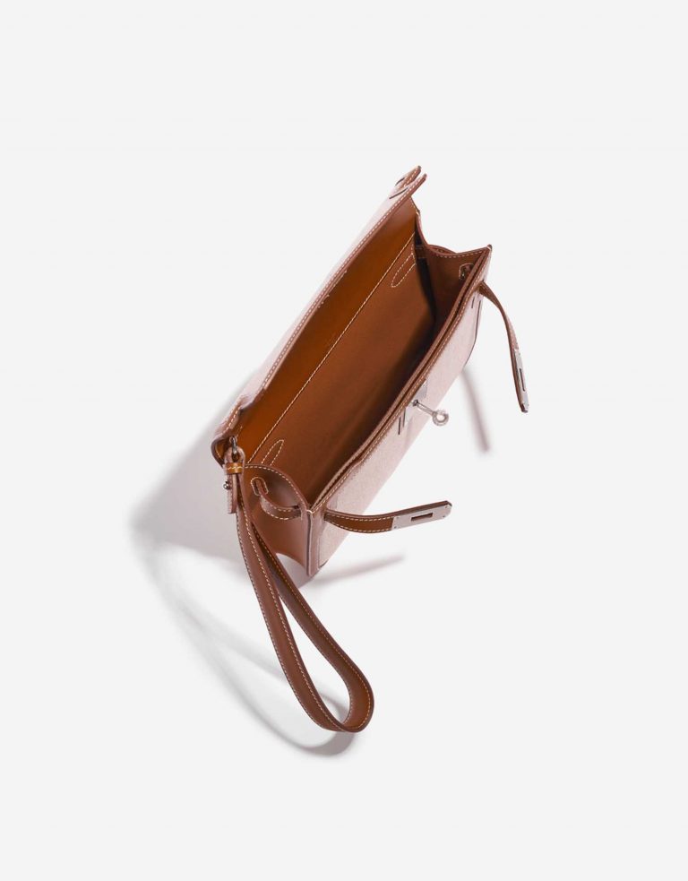 TÚI Hermès Kelly Dépêches Pouch 25 Toile Barenia Fauve Silver Buckle khóa trắng