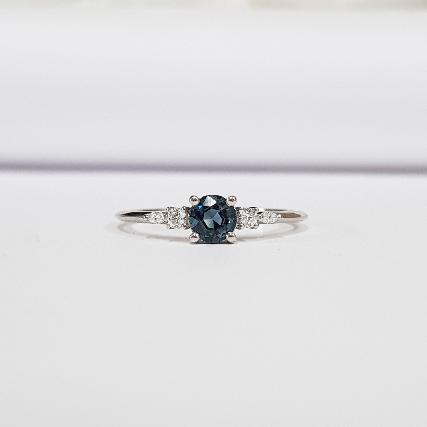 TEAL SAPPHIRE AND DIAMOND ENGAGEMENT RING