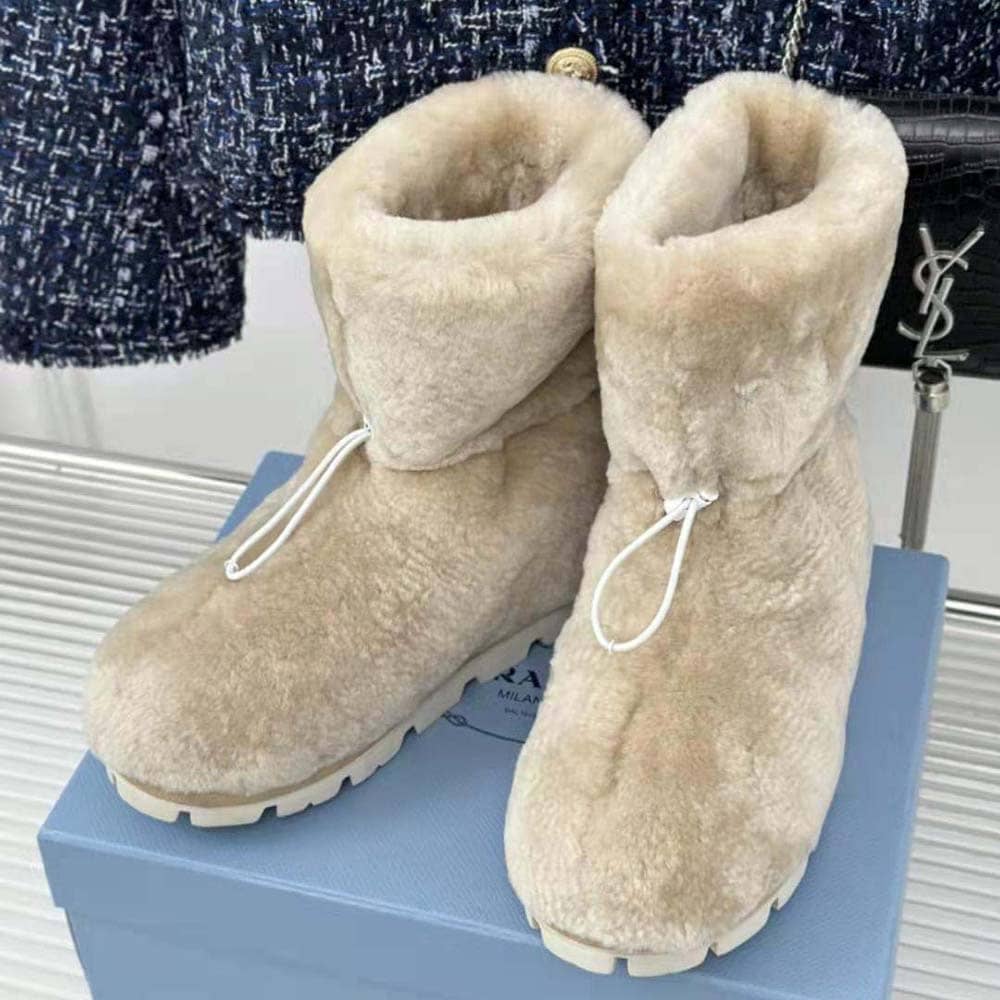 GIÀY Prada Women Shearling Booties with Enameled Metal Triangle Logo-Beige