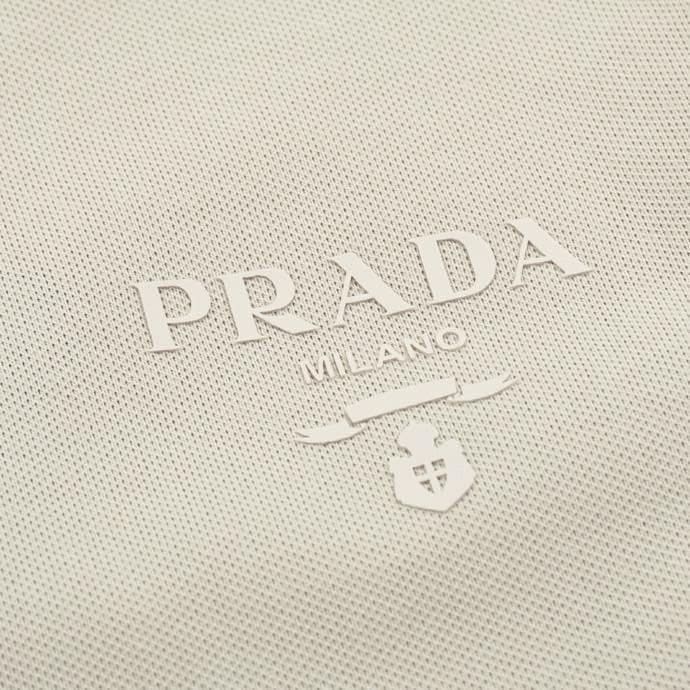 ÁO PRADA POLO SHIRT MÀU KEM UNISEX