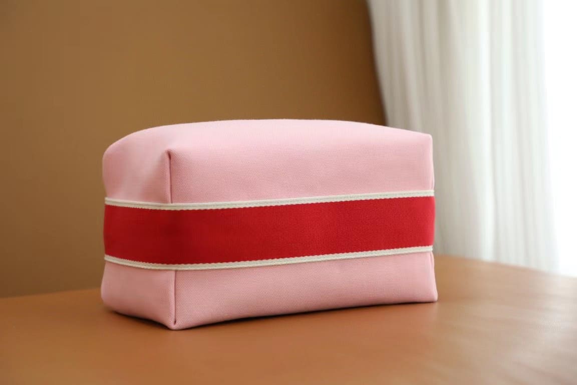 TÚI HERMES TROUSSE DE TOILETTE BRIDE A BRAC PM H MÀU HỒNG
