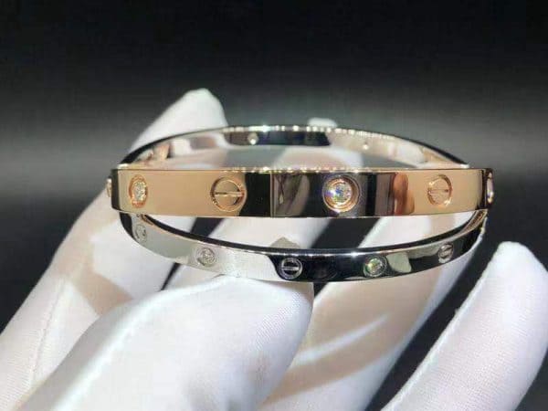 Vòng tay Cartier 18k vàng hồng và trắng 12 viên kim cương Double Love 18K  (Liên hệ để biết giá)