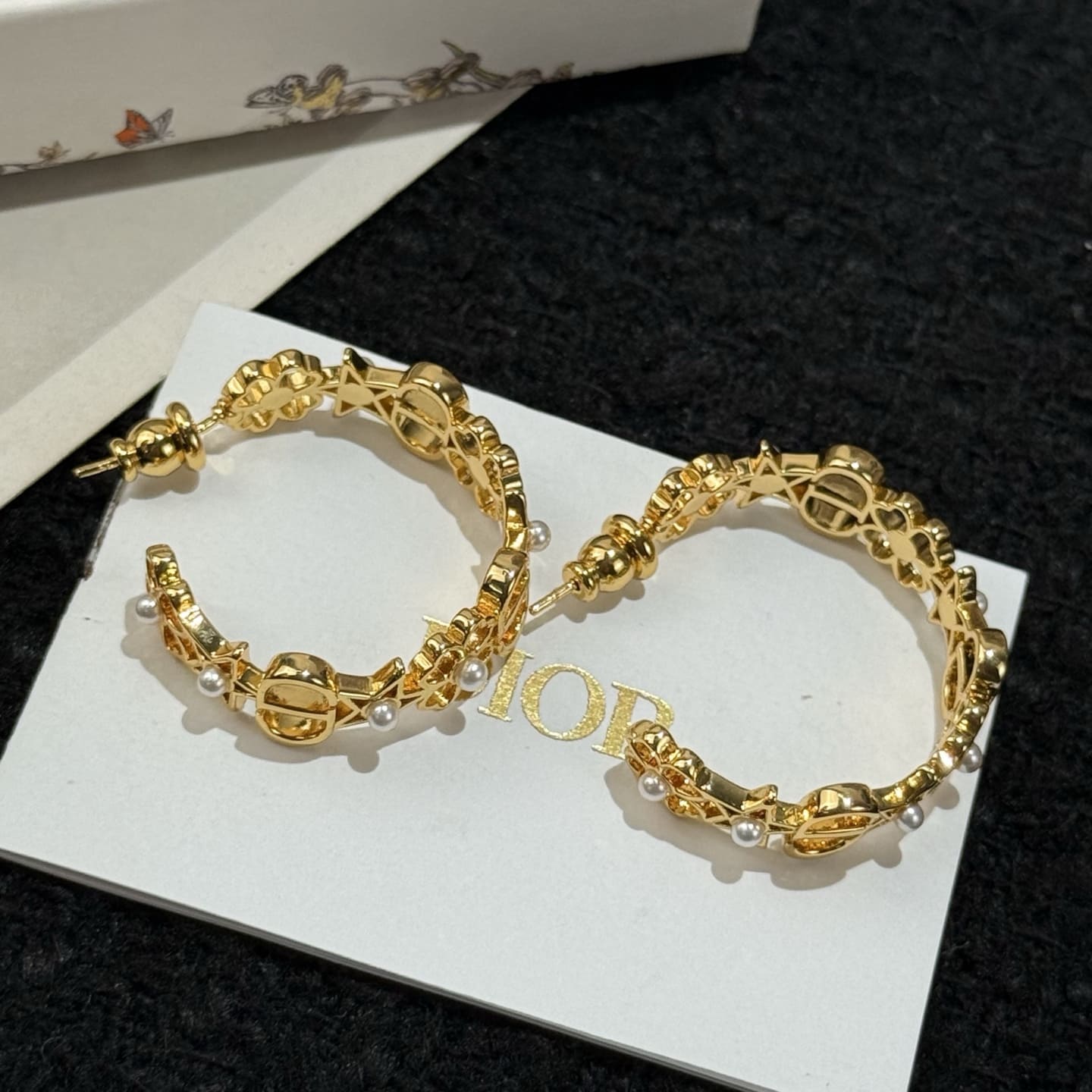 HOA TAI DIOR CD STARS TRIBALES