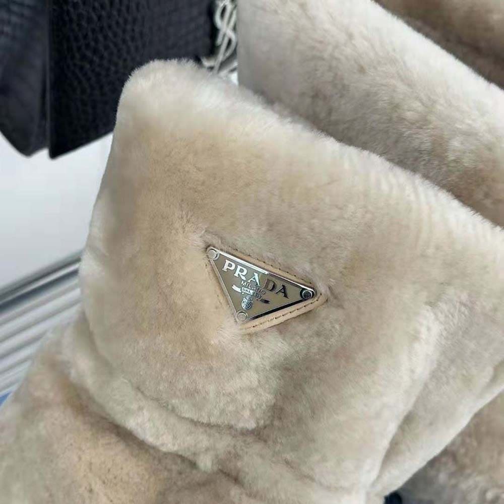 GIÀY Prada Women Shearling Booties with Enameled Metal Triangle Logo-Beige