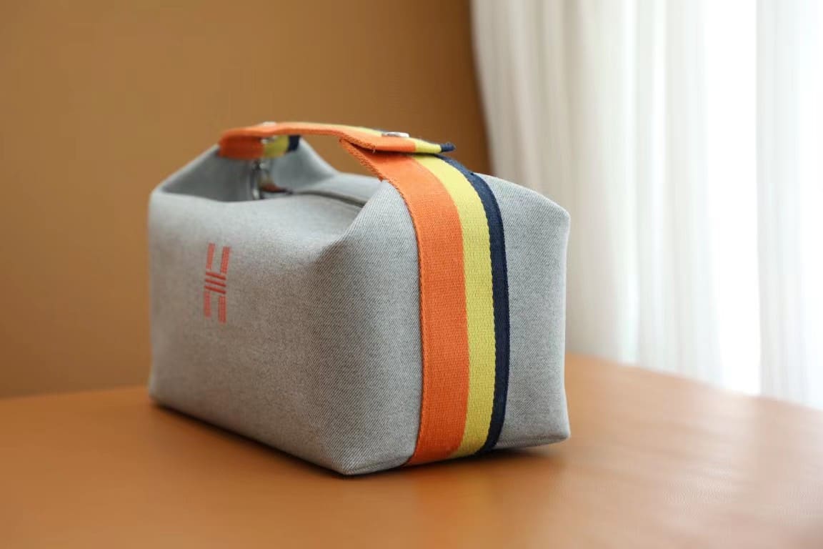 TÚI HERMES TROUSSE DE TOILETTE BRIDE A BRAC PM H MÀU CAM