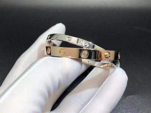 Vòng tay Cartier 18k vàng hồng và trắng 12 viên kim cương Double Love 18K  (Liên hệ để biết giá)