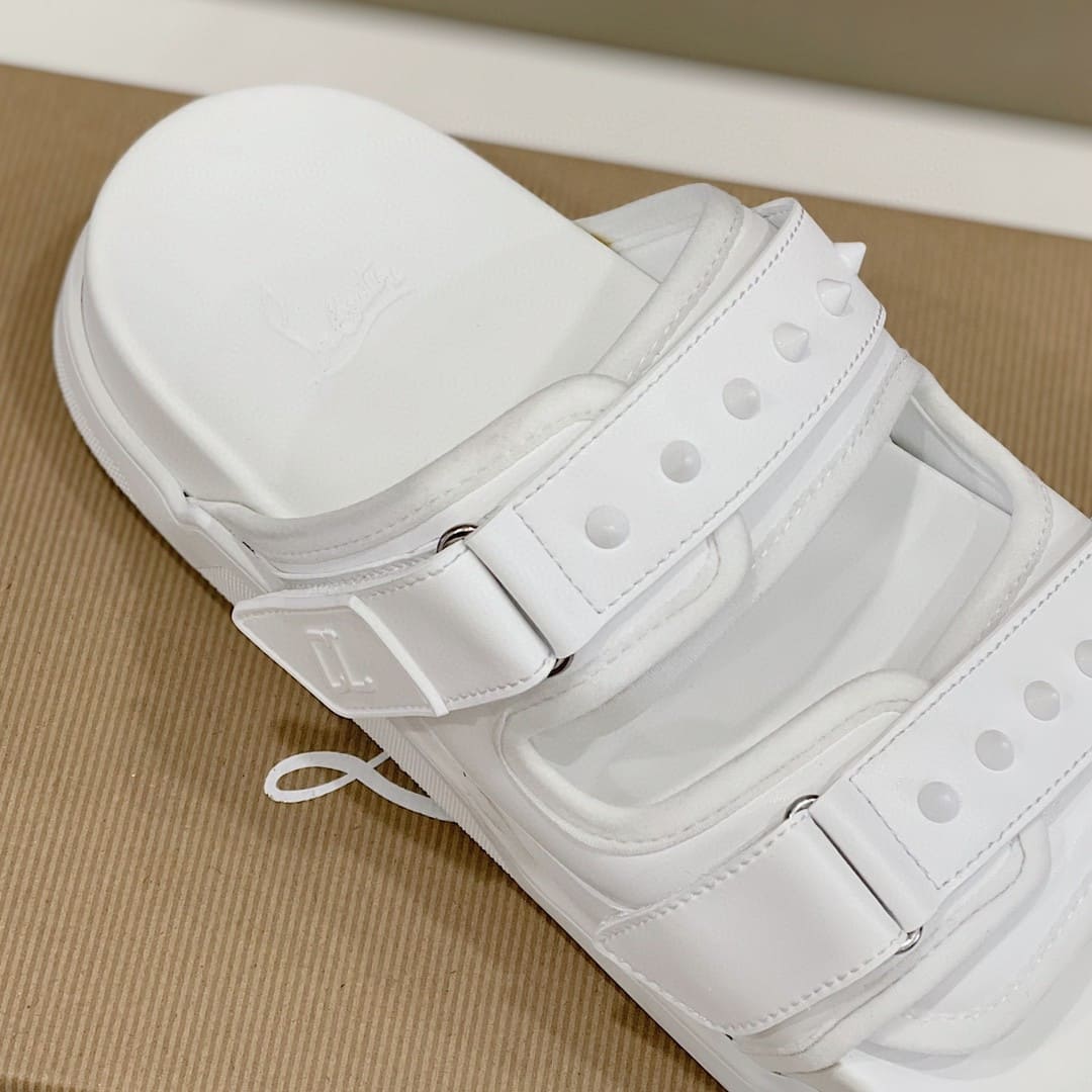 DÉP CHRISTIAN LOUBOUTIN CL LOGO SPIKES SANDAL AAA