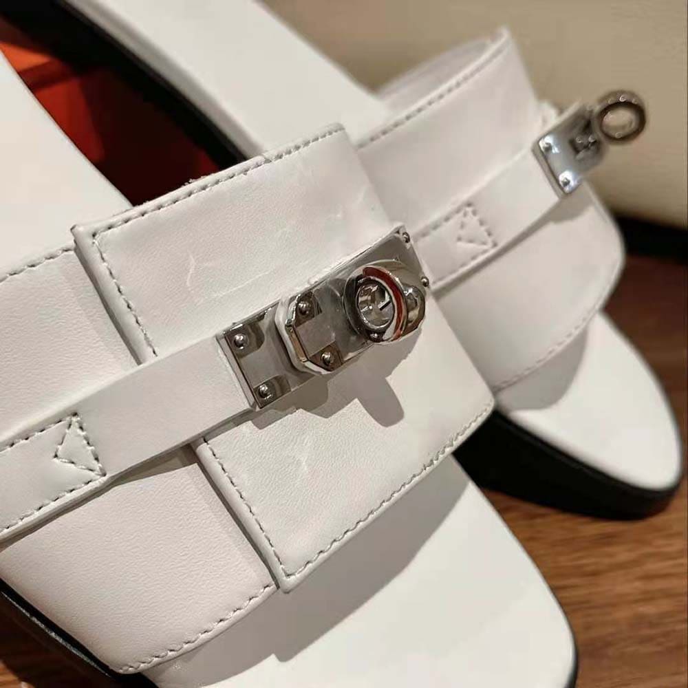 DÉP Hermes Women Giulia Sandal in Calfskin with Iconic Palladium-Plated Kelly Buckle-White