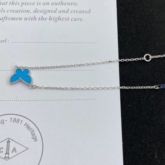 VÒNG TAY VAN CLEEF & ARPELS ALHAMBRA BUTTERFLY TURQUOISE GOLD 18K WHITE GOLD