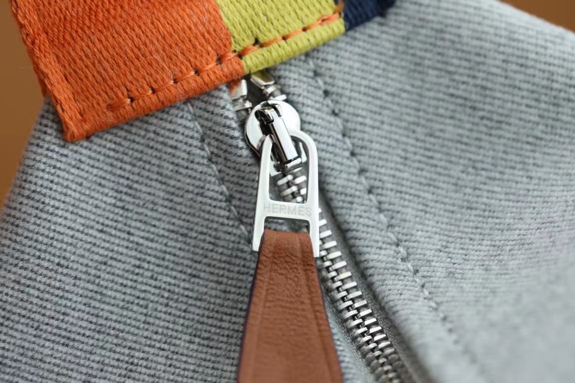 TÚI HERMES TROUSSE DE TOILETTE BRIDE A BRAC PM H MÀU CAM