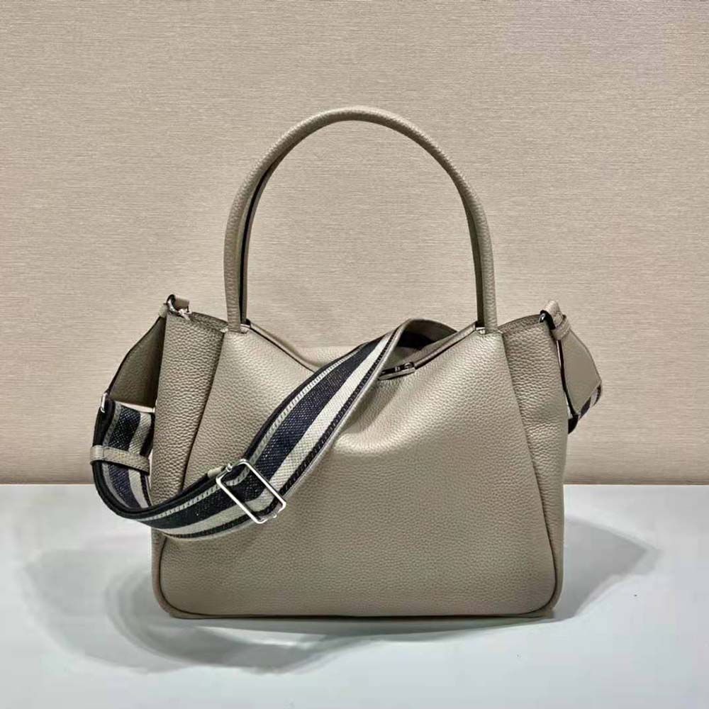 TÚI Prada Women Large Leather Handbag with the Prada Metal Lettering Logo Gleaming at Its Center-Brown