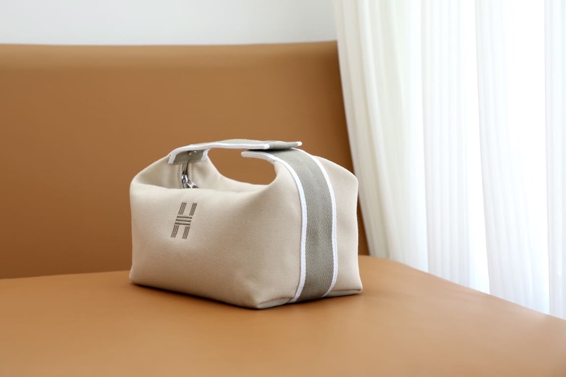 TÚI HERMES TROUSSE DE TOILETTE BRIDE A BRAC PM H MÀU XÁM