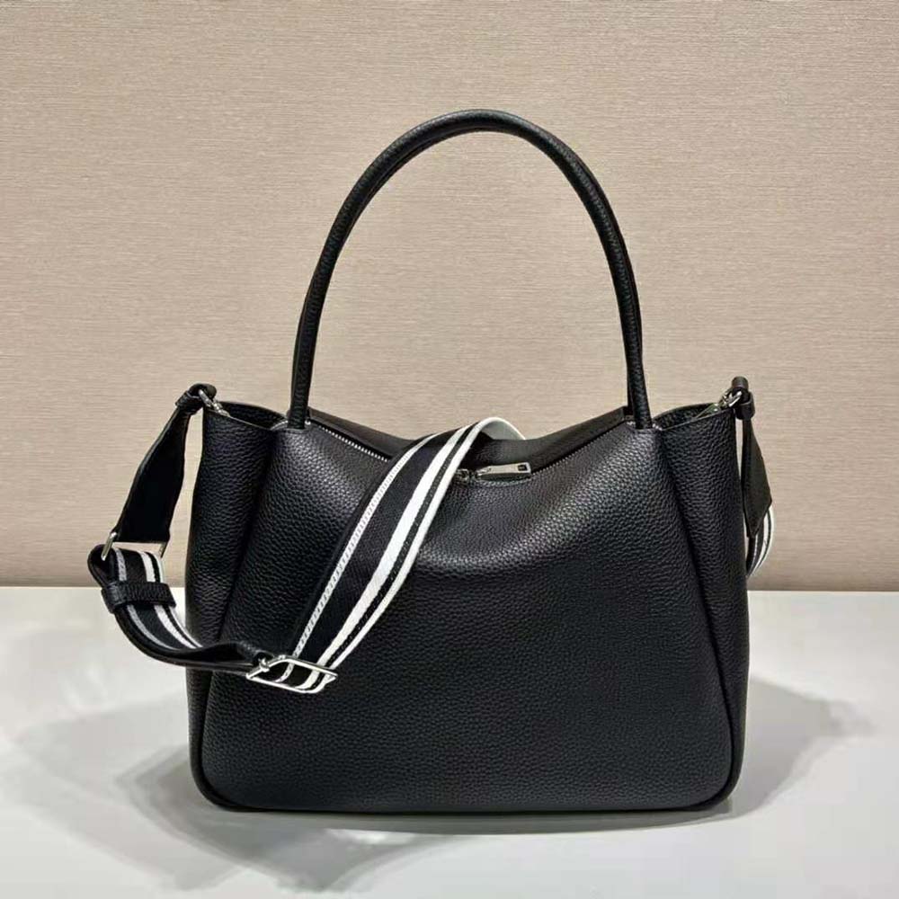 TÚI Prada Women Large Leather Handbag with the Prada Metal Lettering Logo Gleaming at Its Center-Black
