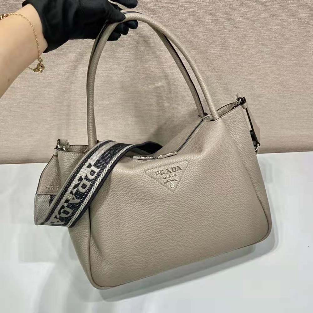 TÚI Prada Women Large Leather Handbag with the Prada Metal Lettering Logo Gleaming at Its Center-Brown