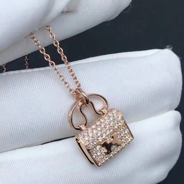 Vòng cổ Hermes Constance Amulette vàng hồng 18K