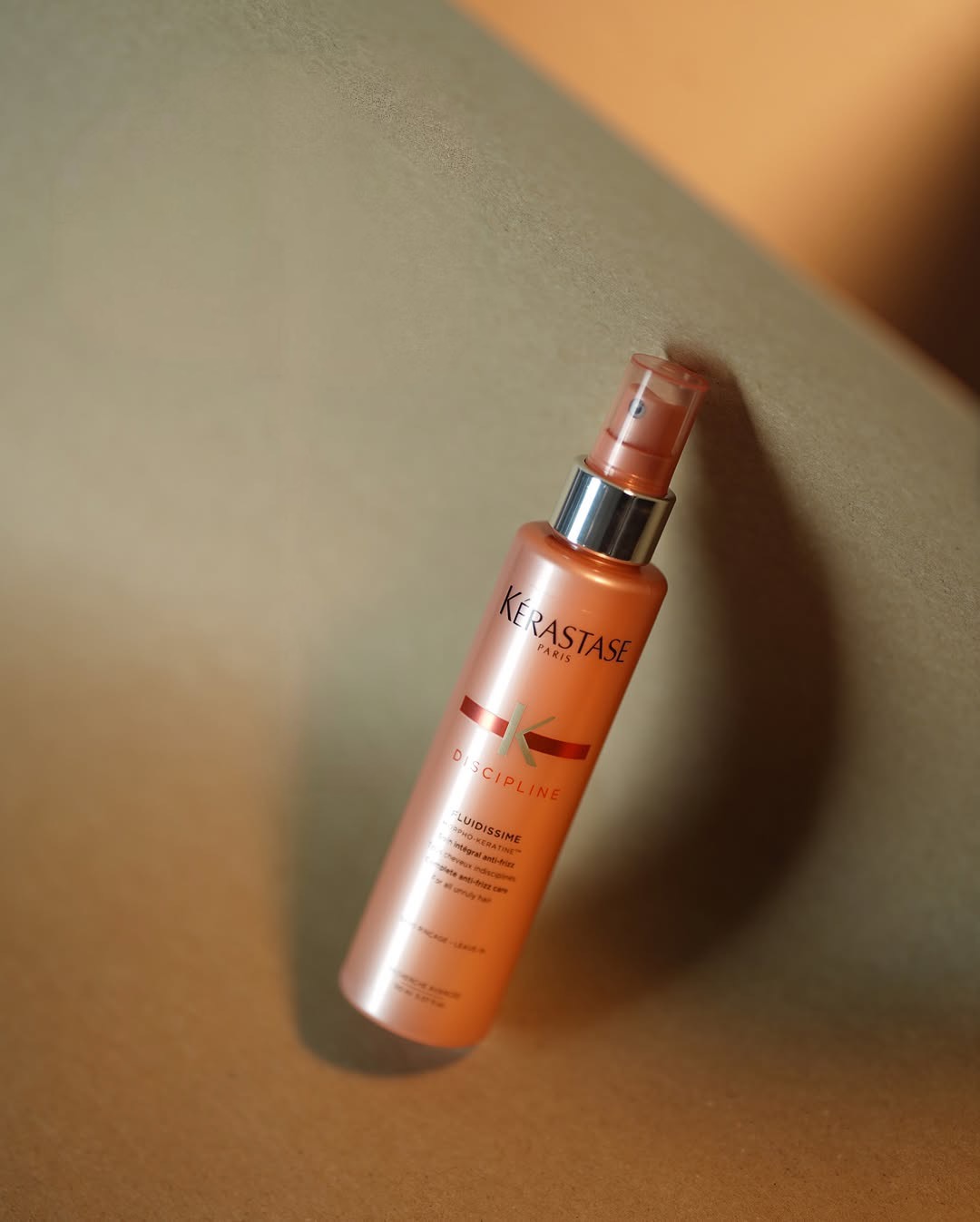 Xịt dưỡng Kérastase Discipline Fluidissime cho tóc xù, tóc khô rối, xoăn nhẹ đến trung bình 150ml
