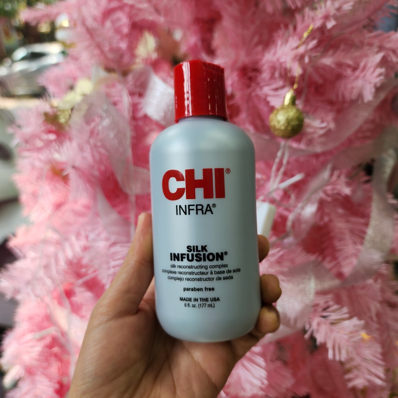 Tinh dầu dưỡng tóc CHI Infra Silk Infusion (CHI Infra Silk Infusion Leave-In Reconstructing Treatment)