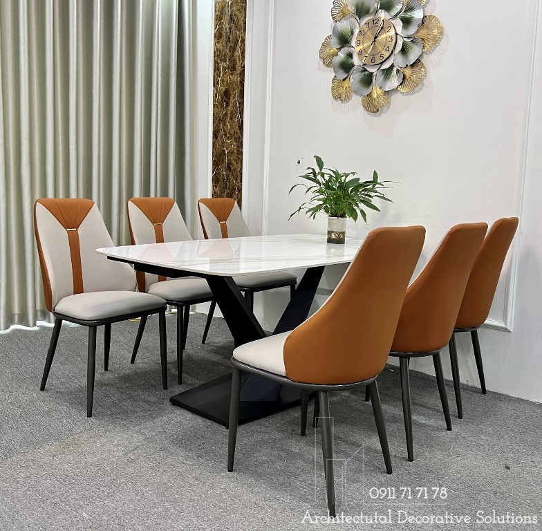 Bàn Ăn 6 Ghế Mặt Đá 902S bàn ăn mặt đá nhân tạo là một thiết kế tiên tiến và đẹp mắt cho phòng ăn của bạn. Với mặt bàn đá nhân tạo chất lượng cao và chân sắt sơn tĩnh điện, bạn sẽ có chiếc bàn ăn đẹp mắt với độ bền lâu dài. Với thiết kế 6 ghế, bạn có thể thoải mái chia sẻ bữa ăn với gia đình và bạn bè một cách dễ dàng và thoải mái.