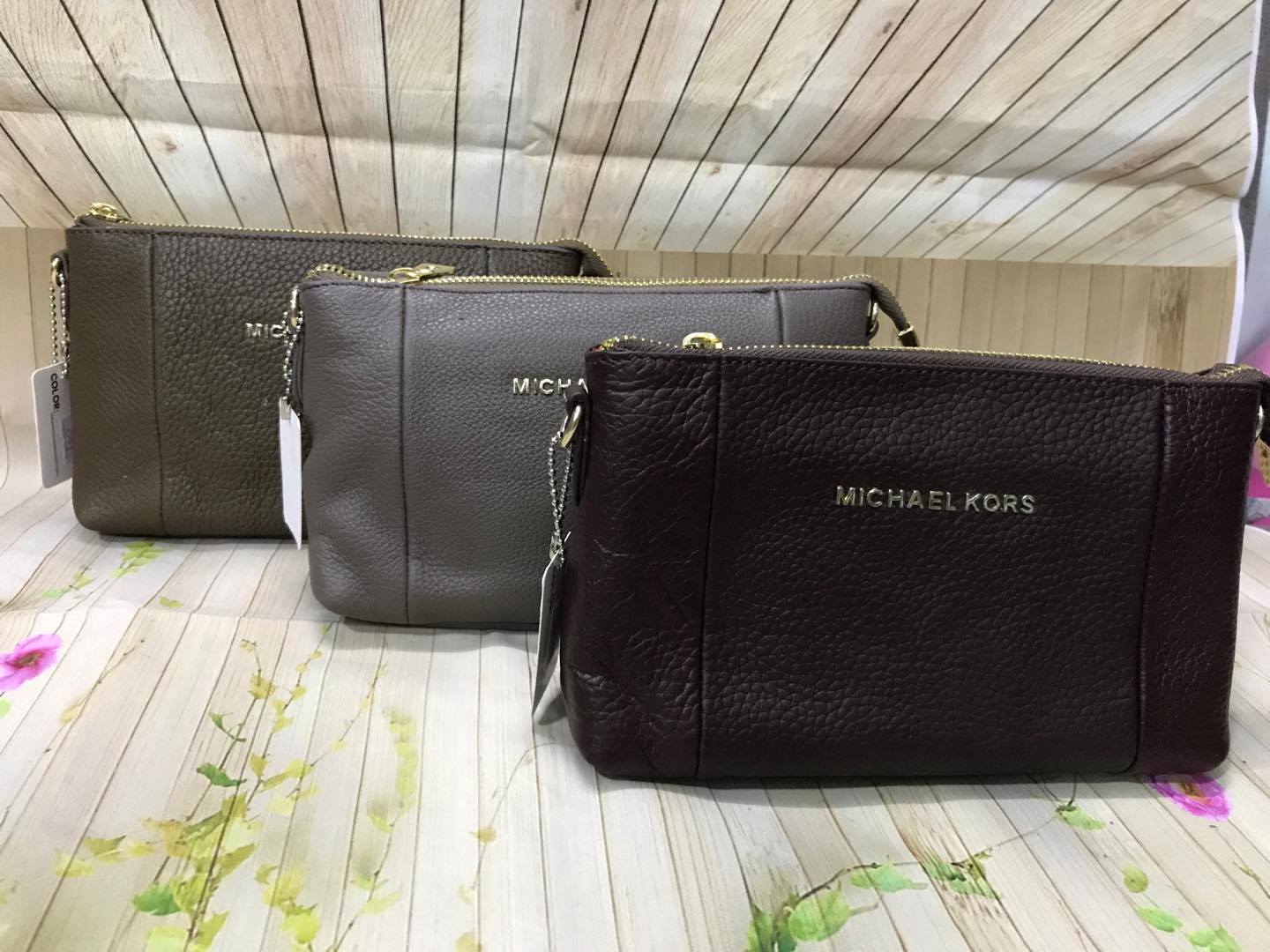 Túi da gắn logo Mk ( ko phai MK)