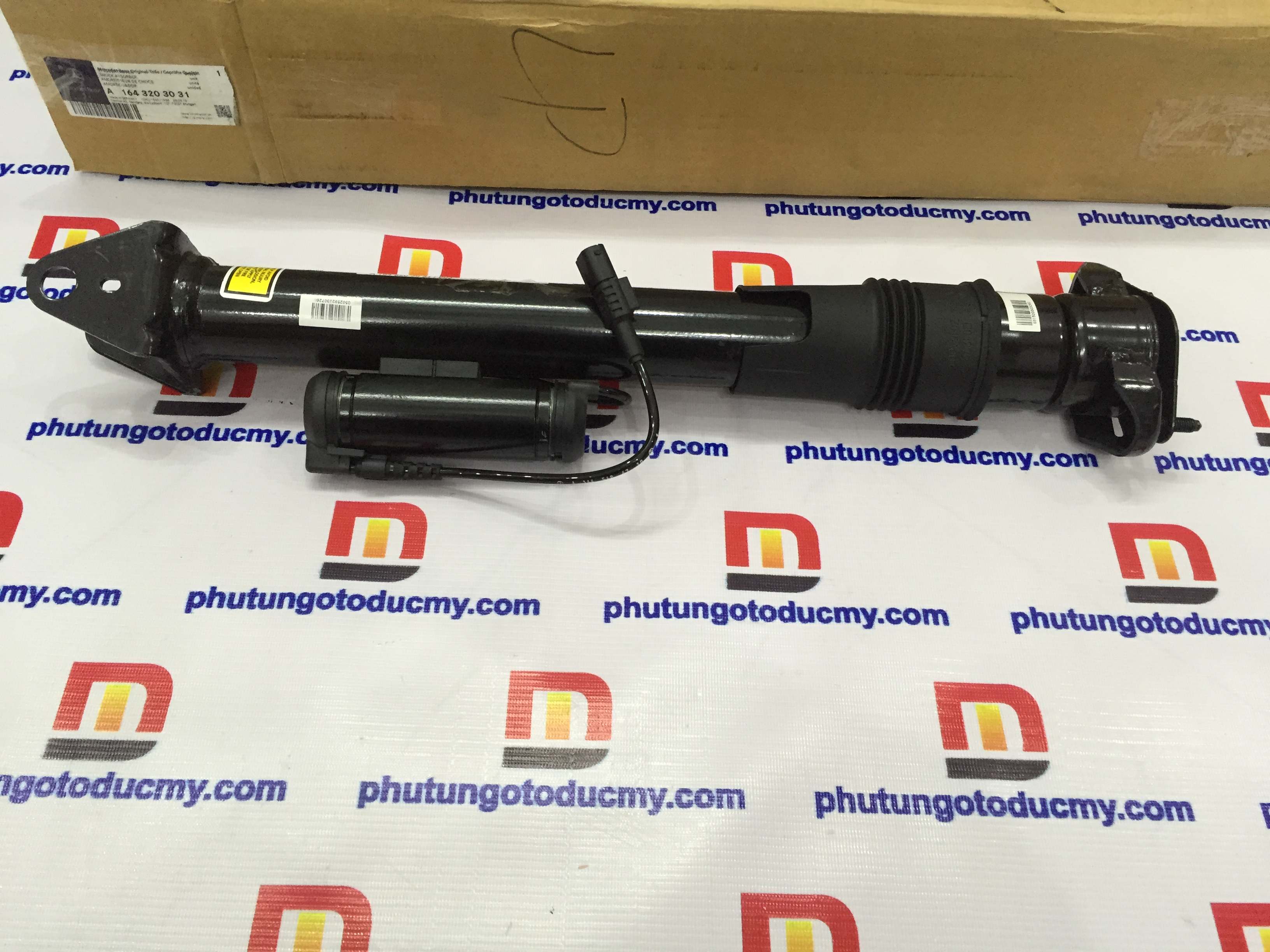 Giảm xóc sau Mercedes GL320,GL450,GL550 W164 -A1643203031
