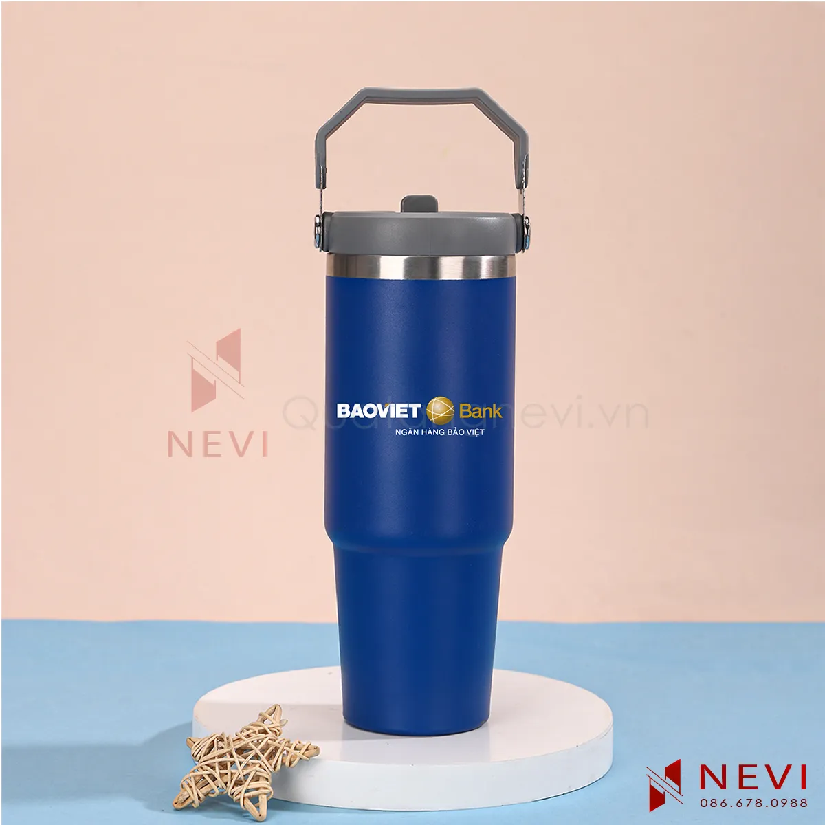 cốc giữ nhiệt có quai xách màu xanh da trời in logo tại quà tặng nevi