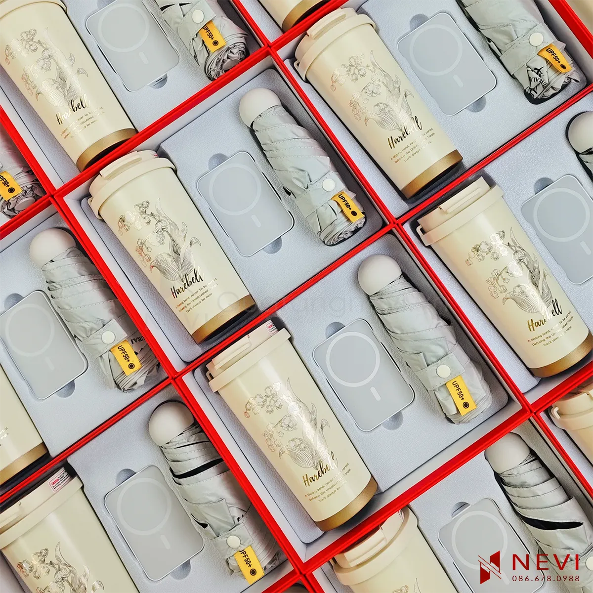 bộ quà tặng số lượng lớn từ cốc giữ nhiệt inox 316 màu trắng, ô gấp gọn và sạc dự phòng