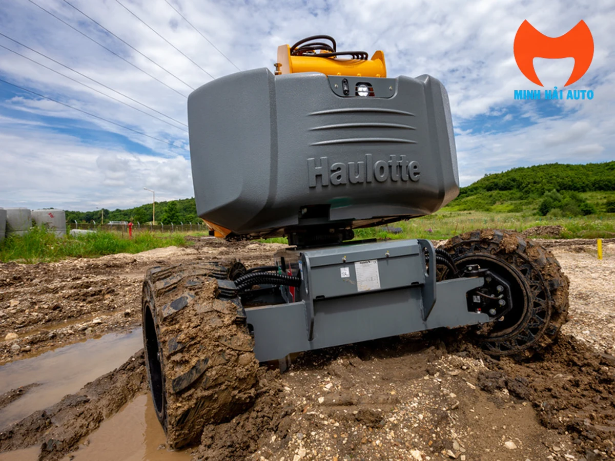 Cầu trước dao động và bốn bánh lái của Haulotte HA16 RTJ PRO