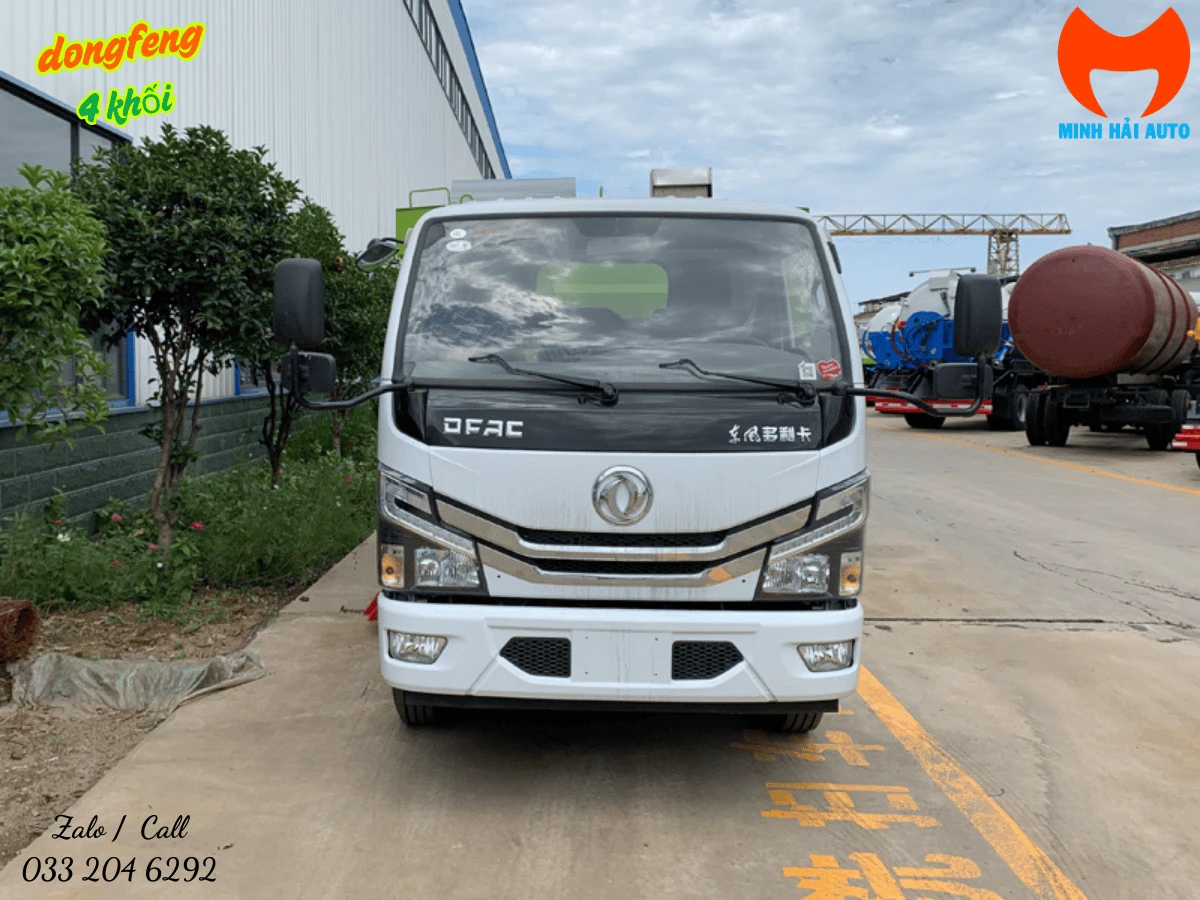 Đầu xe quét đường Dongfeng 4 khối nhìn chính diện, thấy rõ lưới tản nhiệt và gạt mưa cabin