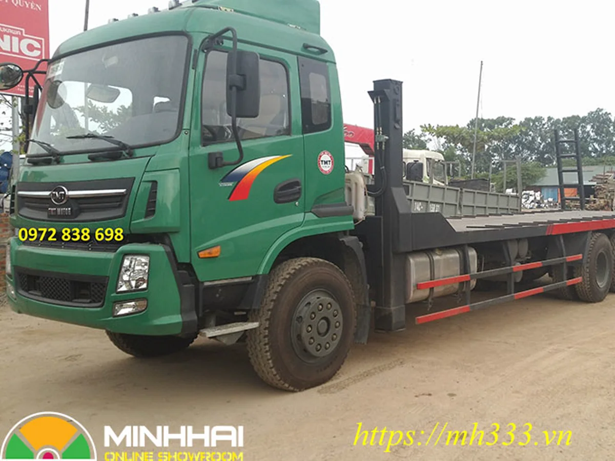 Xe nâng đầu Cửu Long TMT 3 chân màu xanh với sàn chở máy phía sau
