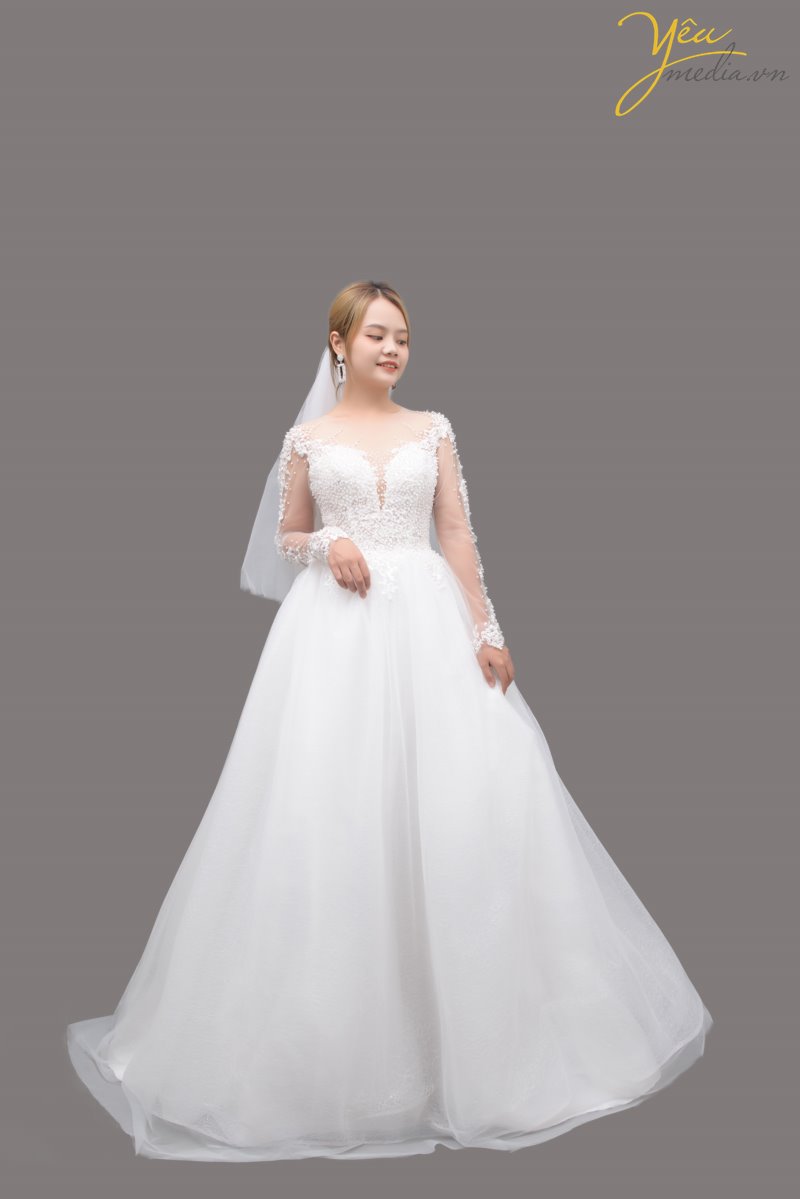 Váy cưới Nexy với hàng ngọc trai được đính cườm sang trọng trên ngực váy và thân váy sẽ làm tôn lên vẻ đẹp của cô dâu trong ngày cưới rực rỡ. 