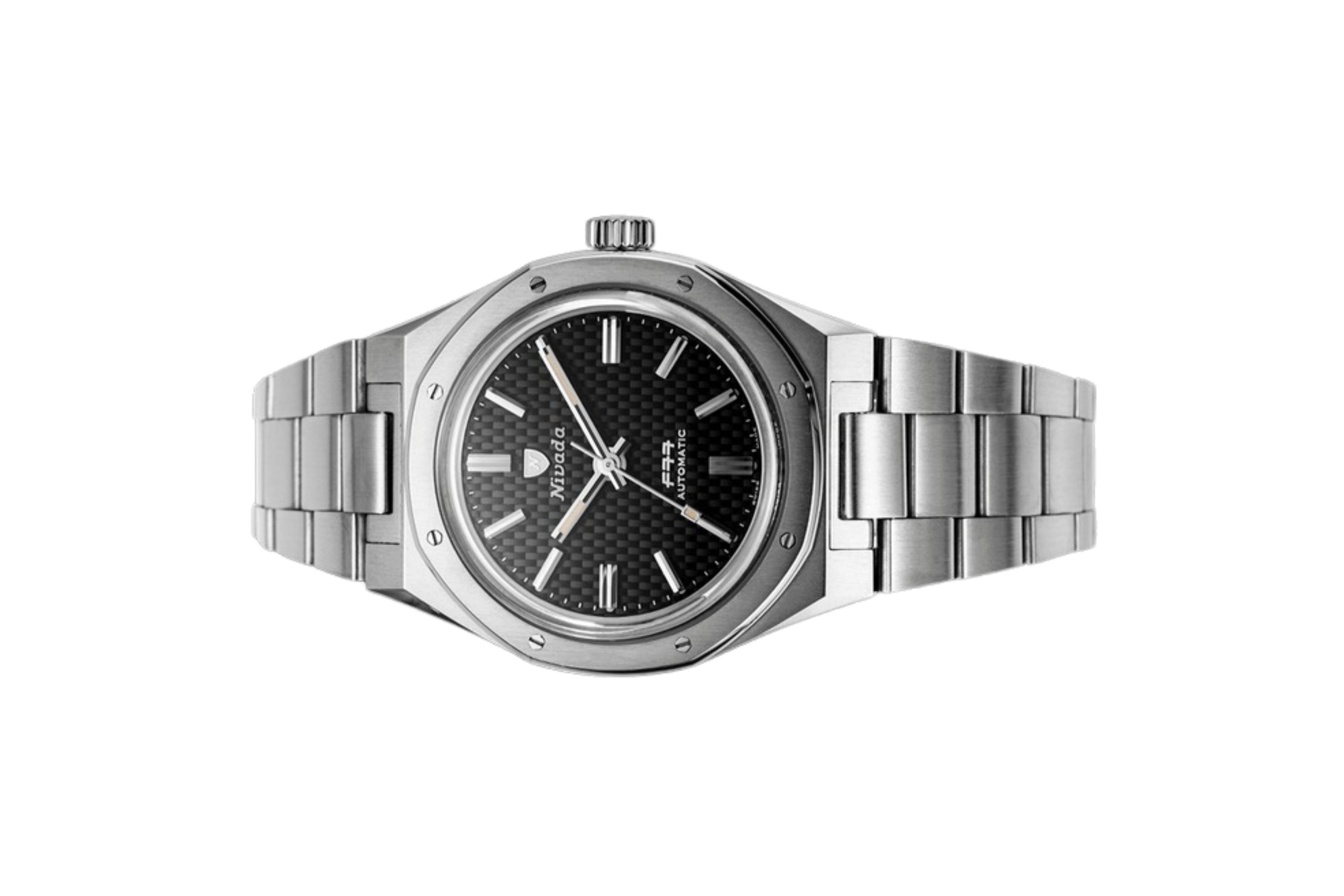Đồng hồ đeo tay thương hiệu Nivada Grenchen, dòng sản phẩm F77, Ref number: 68000A, mặt số đen, size 37mm, máy tự động, vỏ và dây đồng hồ bằng thép không gỉ , mới 100%