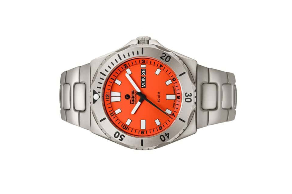 Đồng hồ đeo tay thương hiệu Tutima, dòng sản phẩm M2 Seven Seas, Ref no: 6151-08, mặt số cam Signal, size 44mm, máy tự động, vỏ và dây đồng hồ bằng titanium, hàng mới 100%