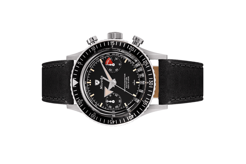 Đồng hồ đeo tay thương hiệu Nivada Grenchen, dòng sản phẩm Chronomaster Broad Arrow N, Ref no: 86014M, mặt số màu đen, size 38mm, lên dây cót bằng tay, vỏ đồng hồ bằng thép không gỉ và dây da bò, mới 100%