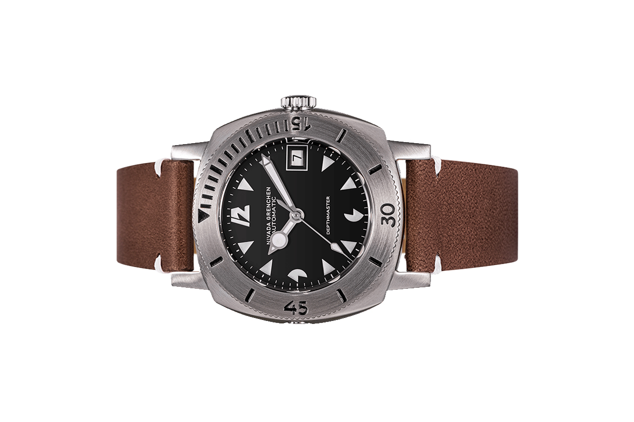 Đồng hồ đeo tay thương hiệu Nivada Grenchen, dòng sản phẩm Depthmaster - Pacman, Ref number: 14104A, mặt số đen, size 39mm, máy tự động, vỏ thép không gỉ 316, dây da bò, mới 100%
