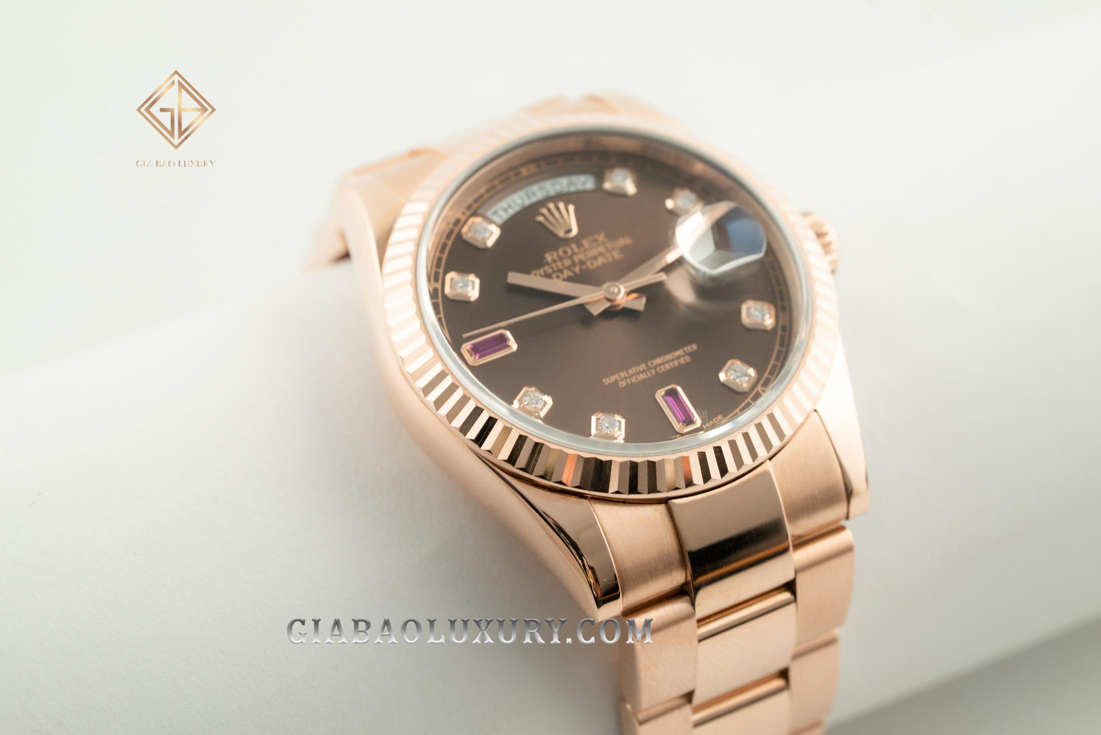 Đồng Hồ Rolex Day-Date 36 118235 Mặt Số Chocolate Đá Ruby Đỏ Dây Đeo Oyster