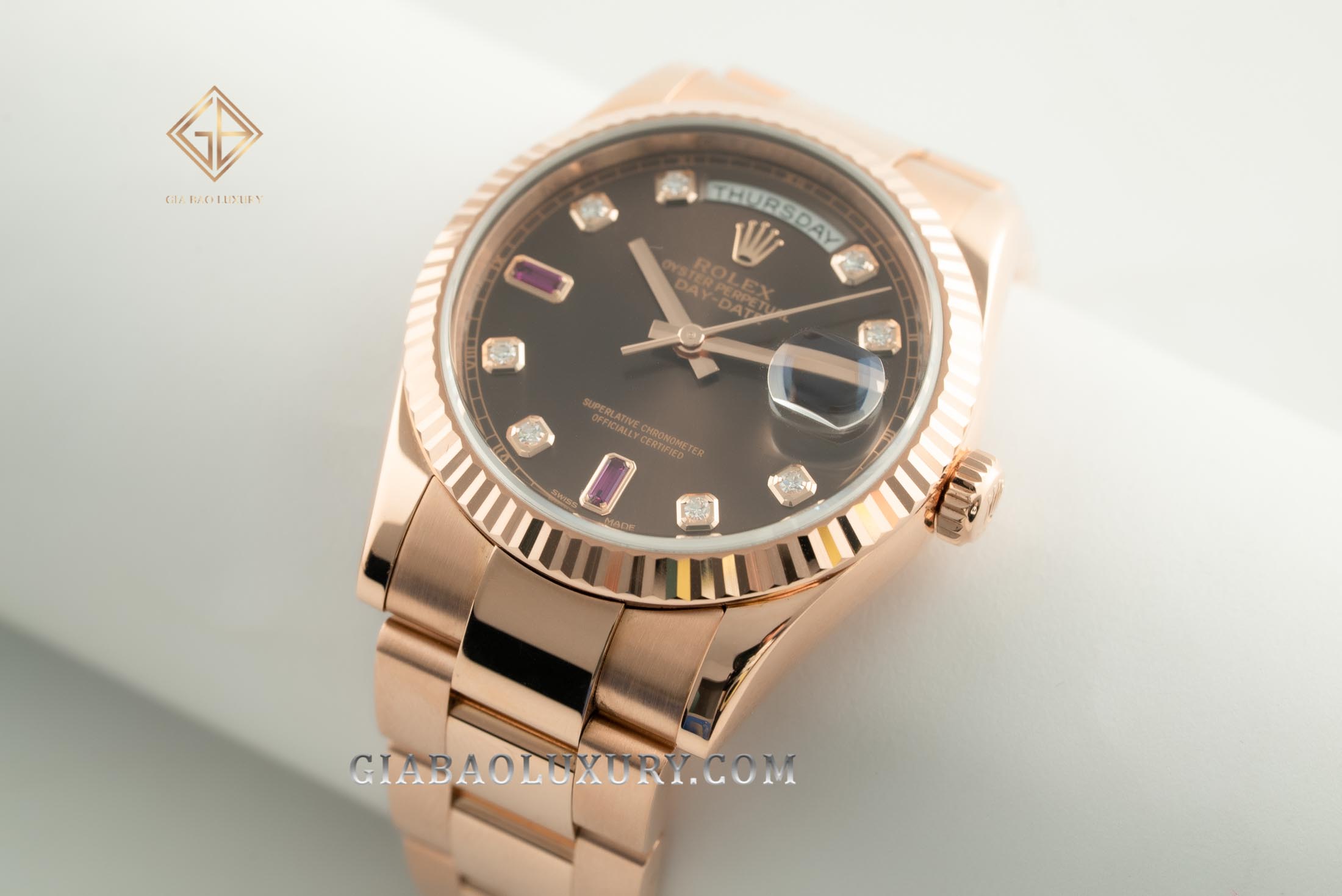 Đồng Hồ Rolex Day-Date 36 118235 Mặt Số Chocolate Đá Ruby Đỏ Dây Đeo Oyster
