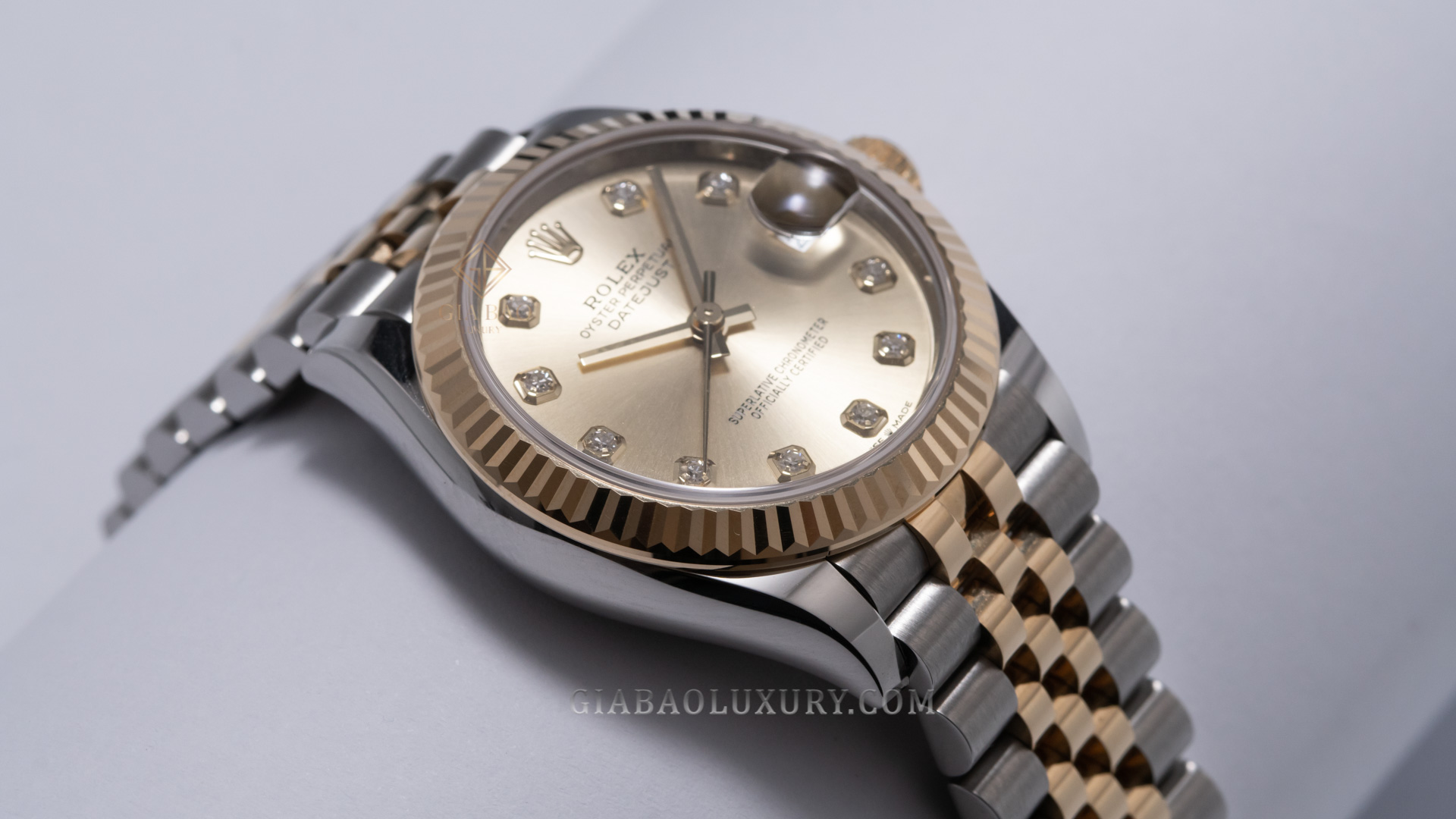 Đồng Hồ Rolex Lady Datejust 31 278273 Mặt Số Vàng Champagne Cọc Số Nạm Kim Cương