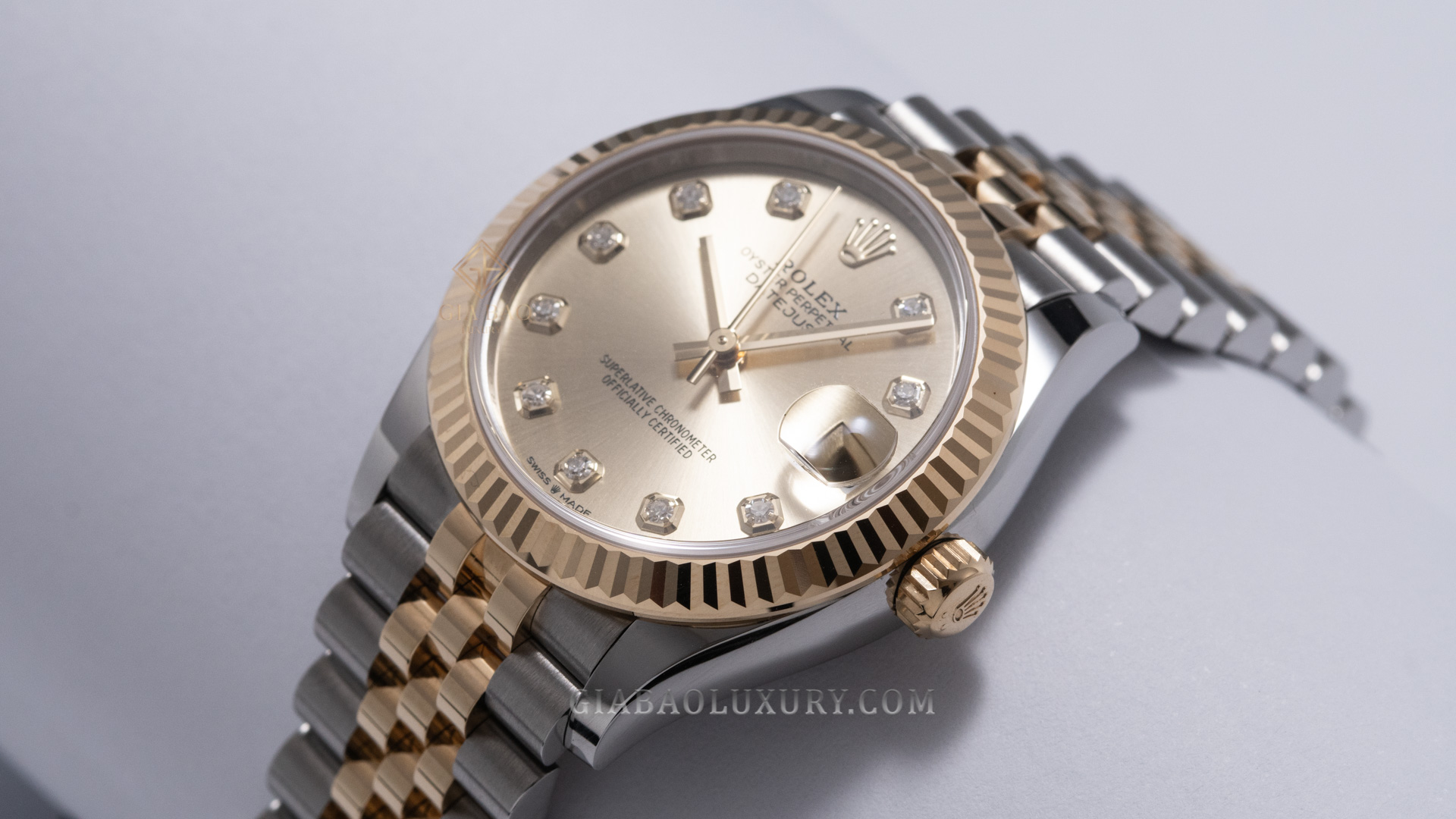 Đồng Hồ Rolex Lady Datejust 31 278273 Mặt Số Vàng Champagne Cọc Số Nạm Kim Cương