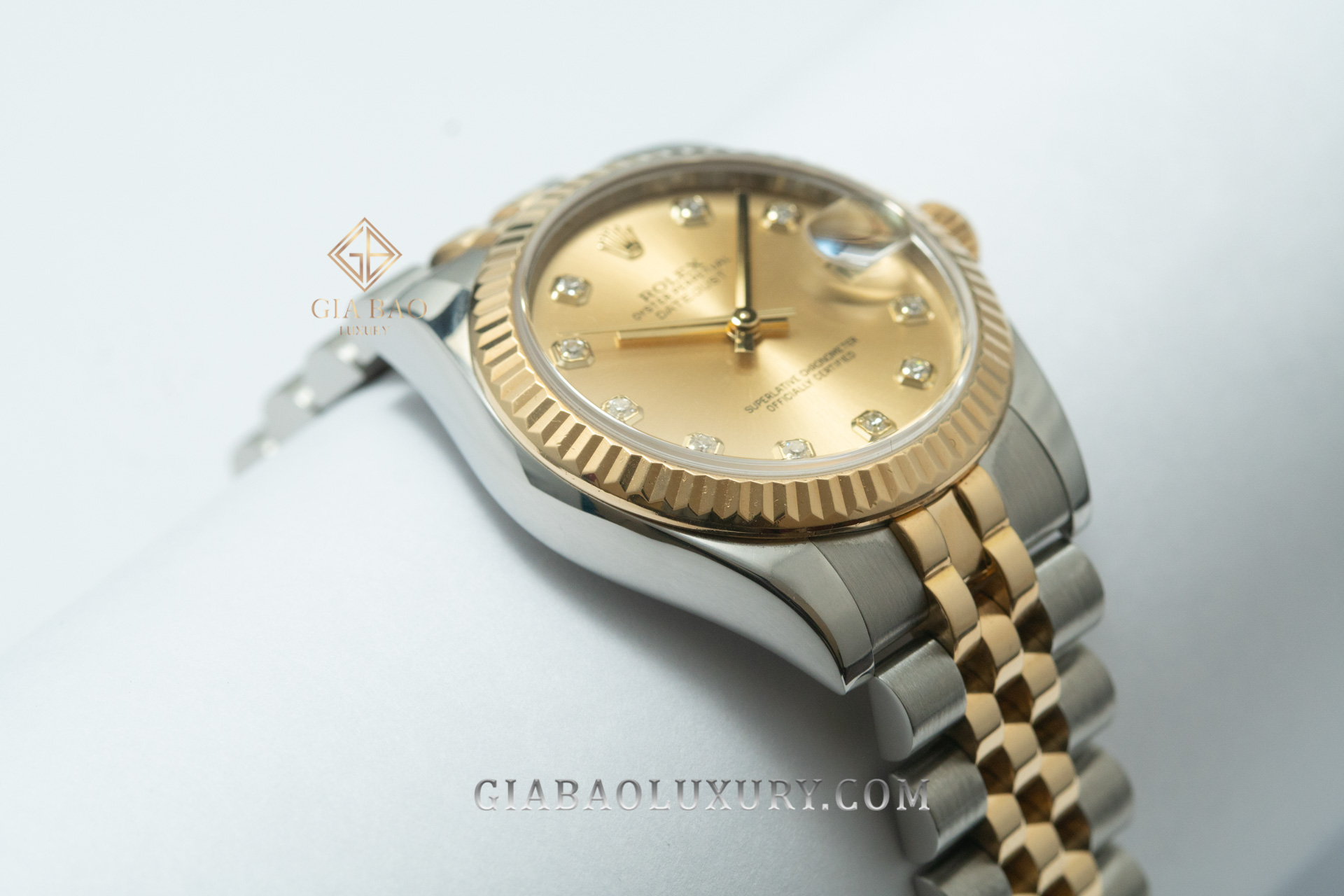 Đồng Hồ Rolex Datejust 31 178273 Mặt Số Vàng Champage Cọc Số Kim Cương