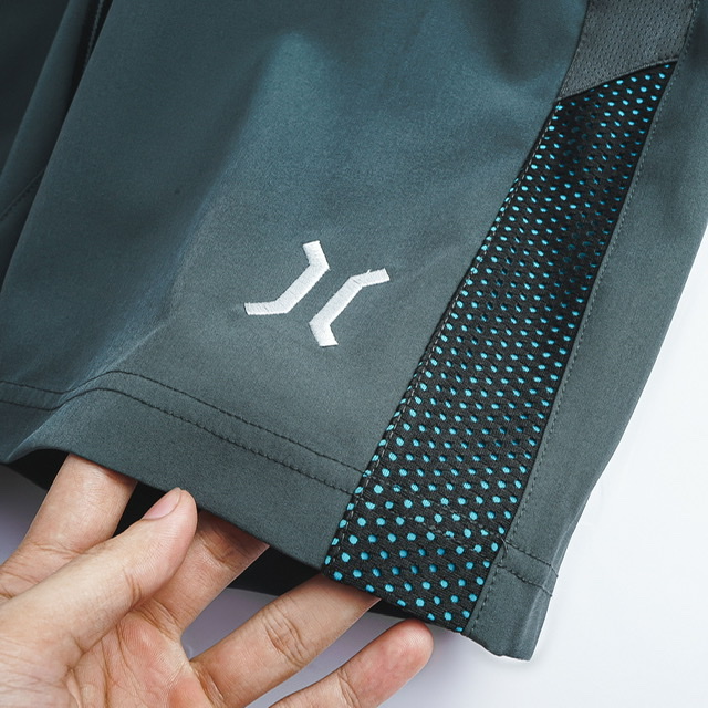 Quần thể thao vải dù phối màu lưới màu đen, có bigsize