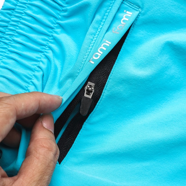 Quần thể thao CAROLLA vải dù có sọc phản quang