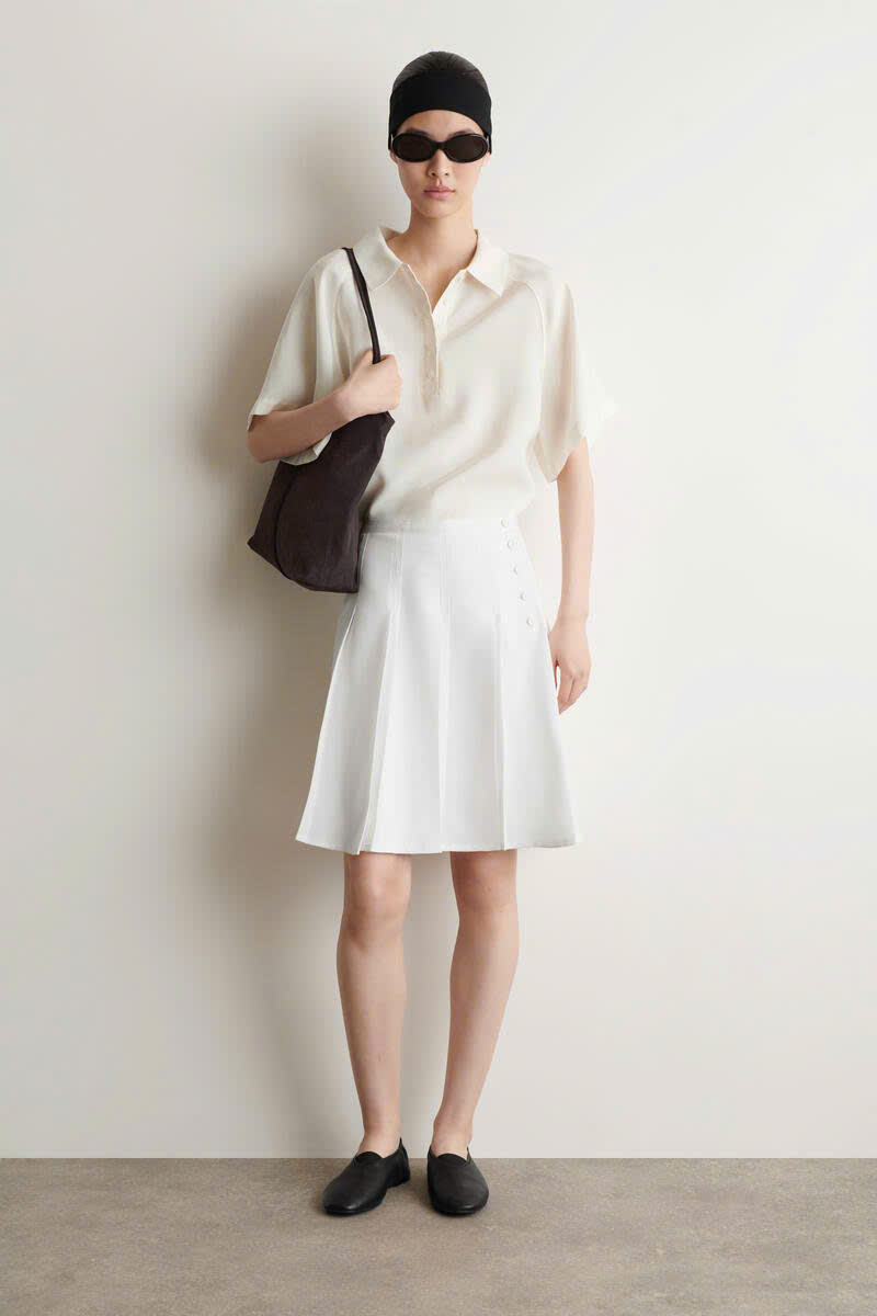Chân váy mini COS xếp ly khuy hông