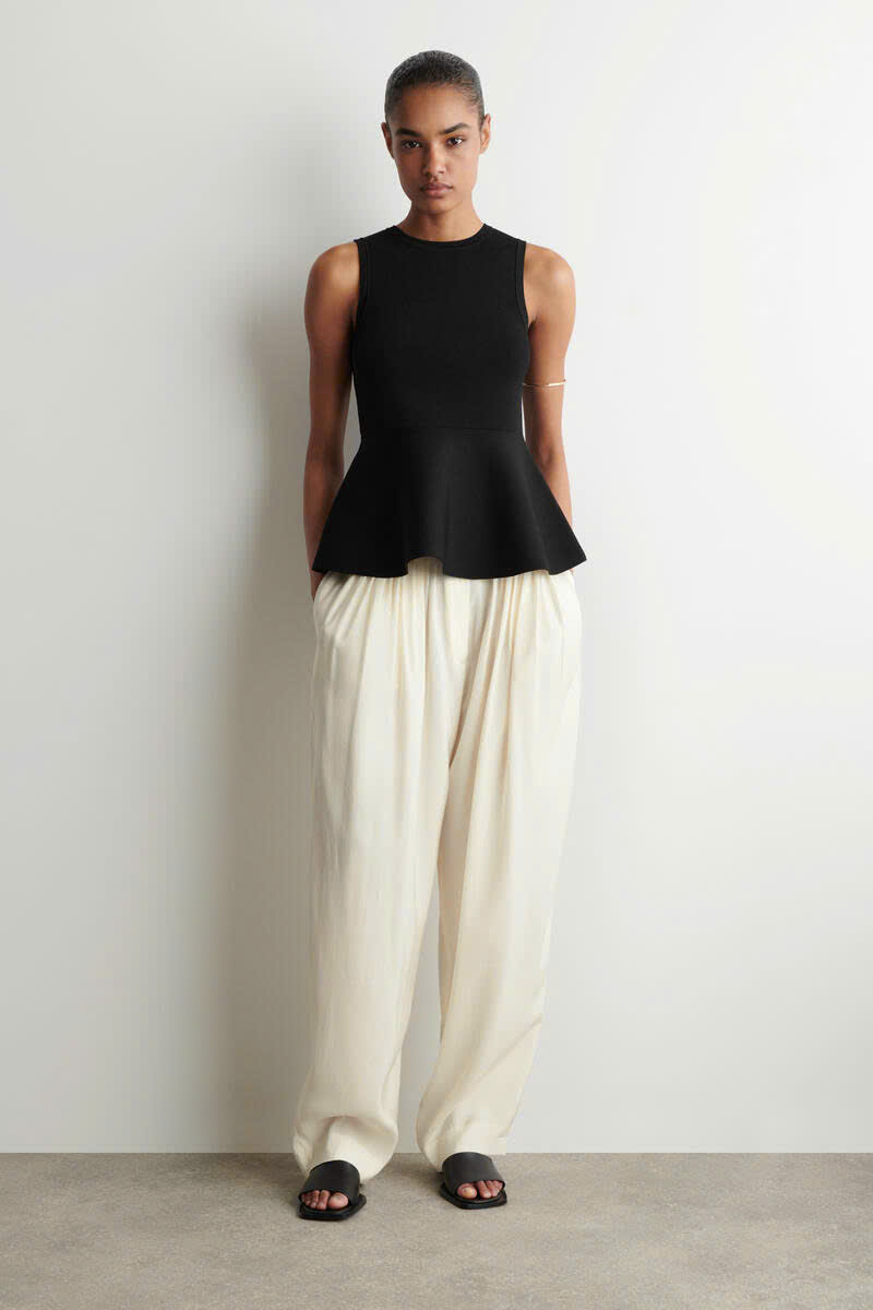 Áo sát nách len tăm đan Peplum cổ điển