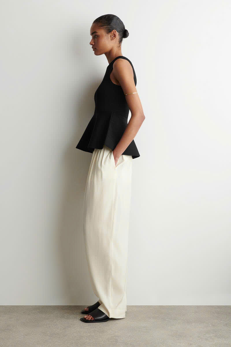 Áo sát nách len tăm đan Peplum cổ điển