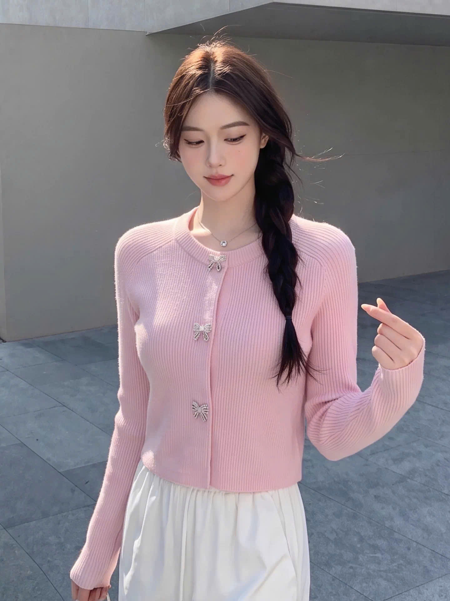 Cardigan len tăm khuy nơ đá dáng lửng