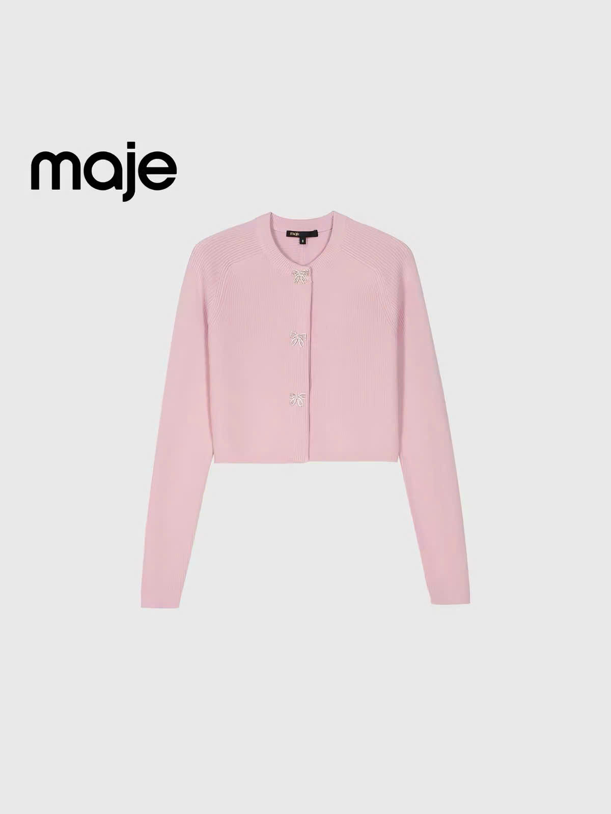 Cardigan len tăm khuy nơ đá dáng lửng