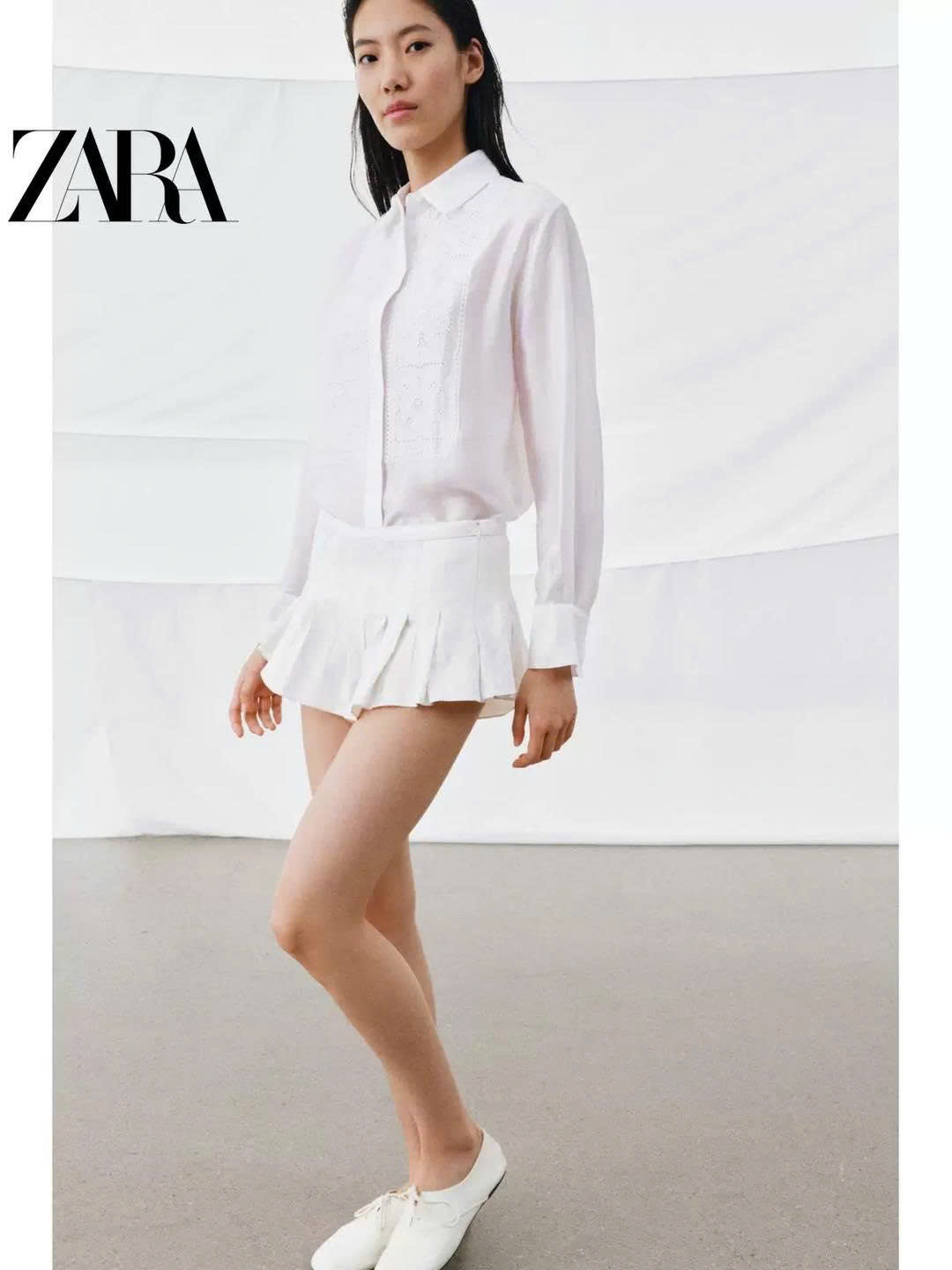 Sơ mi Zara lụa tơ trắng đáp ren ngực